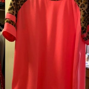 Bright pink with leopard sleeves